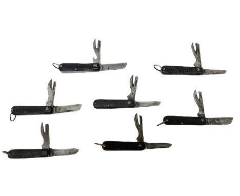 WW2 British army folding jack/clasp knife with blade and can opener marked with broad arrow and date 1944 and six similar exa