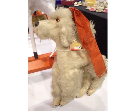 Vintage straw filled unnamed poodle toy dog with glass eyes 
