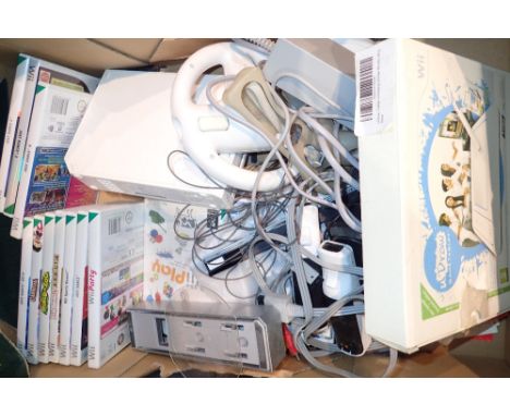 Wii console with accessories games and a Wii Udraw game tablet