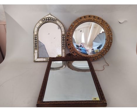A gilt framed mirror with shell cresting, a circular convex gilt mirror plus a lancet shaped mirror with bone and gilded meta