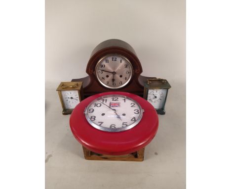A 1920's inlaid mahogany mantel clock, wall clock and two carriage clocks