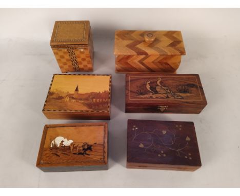 A large selection of inlaid wooden boxes, marquetry and parquetry examples including a jewellery box and a small chest of dra