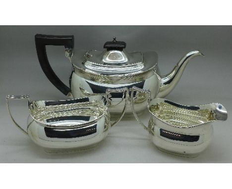 A three piece silver tea service, Birmingham 1940, 948g, 30oz