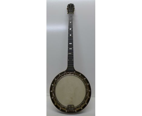 A banjo with mother of pearl inlay, lacking strings, no back