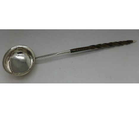 A silver toddy ladle, lacking marks, length 30cm