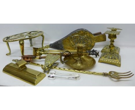 Brassware including a pair of candlesticks, a trivet, a chamber stick, coal tongs, a pair of bellows, a toasting fork, etc.