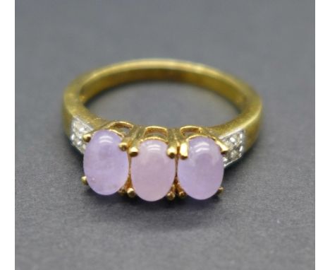 A silver gilt set, purple jade and diamond ring, N