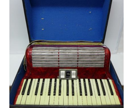 A 1950's Hohner Tango 1M piano accordion, with case