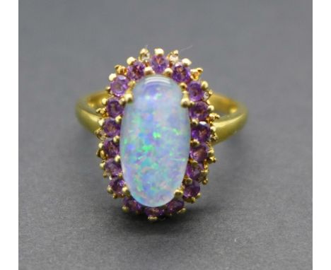 A silver gilt set synthetic opal, amethyst and diamond ring, P