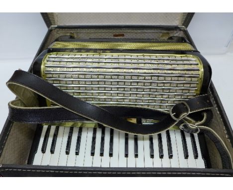 A Hohner Arietta IM accordion, cased