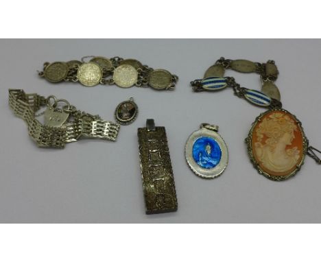 Silver jewellery including an enamel bracelet, two other bracelets and an ingot pendant