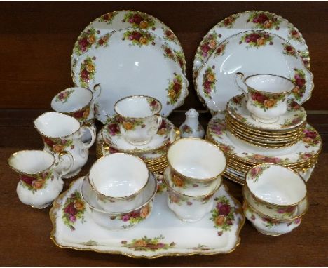 Royal Albert Old Country Roses teaware; eight cups, saucers and side plates, ten medium plates, two cream jugs, two sugar bow