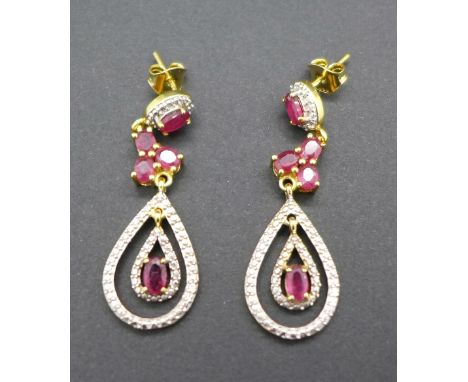 A pair of silver gilt set African ruby earrings, 2.95ct ruby weight