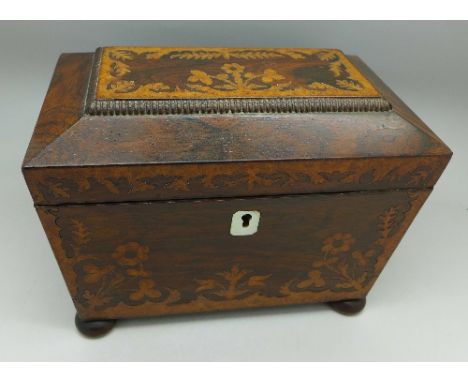 A Victorian rosewood and walnut inlaid tea caddy with mother of pearl escutcheon, a/f