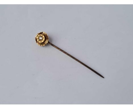 A 15ct gold diamond set stick pin 1.3g inc