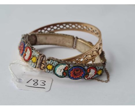 A rolled gold bangle and a mosaic bangle