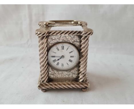 Travelling clock with barley twist cornices, engraved panels 3 inch high London1891