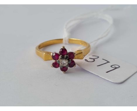 A ruby and diamond cluster ring 18ct gold size m -3.3 gms 