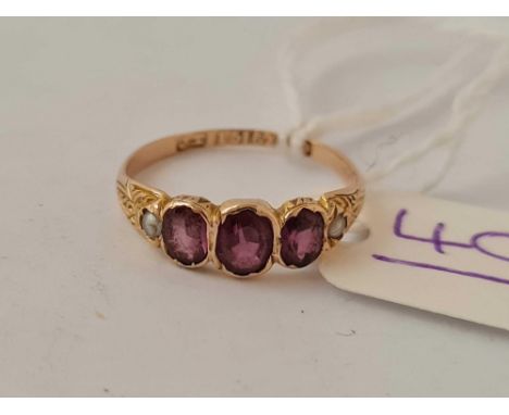 A Almondine garnet ring 15ct gold size K 