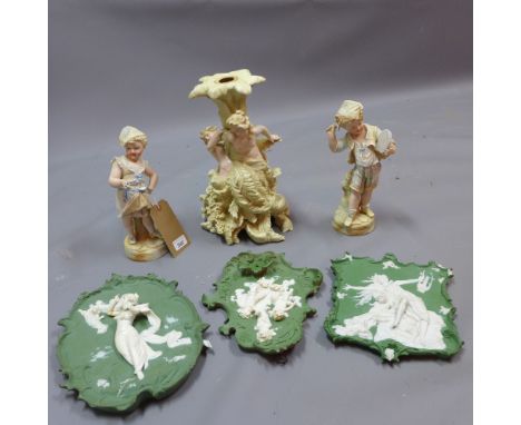 A pair of Continental bisque figures together with three wall plaques and a large console holder in the form of couple by a t