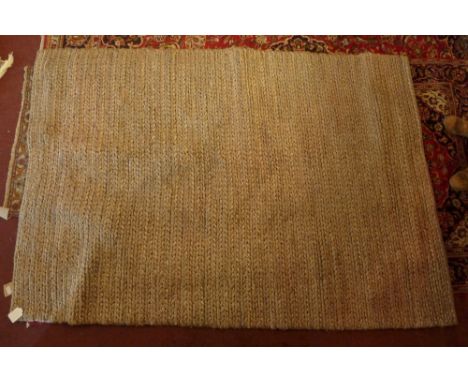 A contemporary woven carpet 230 x 160cm