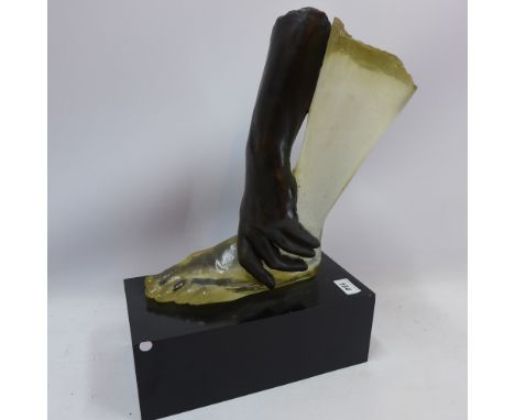A 20th century sculpture lamp of an arm gripping a leg, L 31cm x H 44cm 