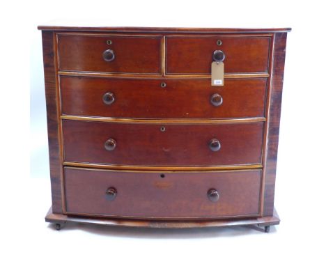 A Victorian mahogany chest of two short over three long drawers raised on step base and castors, H 112 x W 126 x D 55cm 