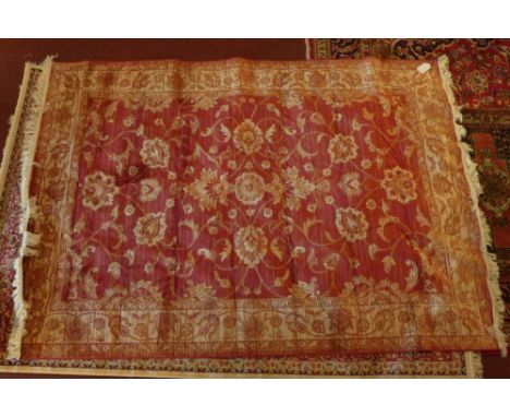 A Ziegler style carpet having a red field 230 x 160cm