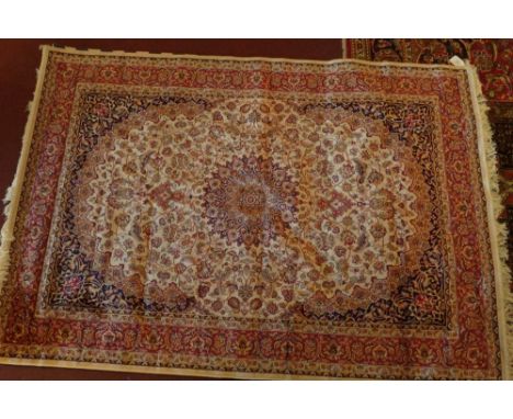 A Keshan style carpet having an ivory field 230 x 160cm