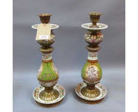 A pair of 20th century Continental ceramic candle holders with brass fittings in the classical taste, H 51cm 