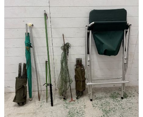A selection of fishing accessories to include chairs, umbrella and landing net 