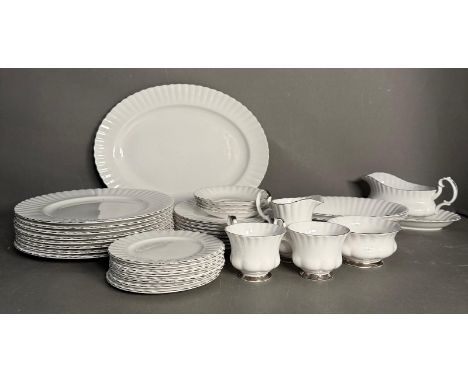 A part Royal Albert Chantilly pattern dinner/tea service to include plates, serving bowls and a gravy boat 