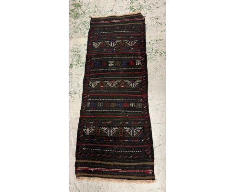 A runner rug 180cm x 70cm 