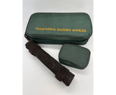 A selection of games including garden boules, travel backgammon and travel boules.