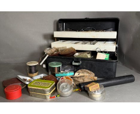 A selection of fishing tackle to include fly's, floats and fishing line