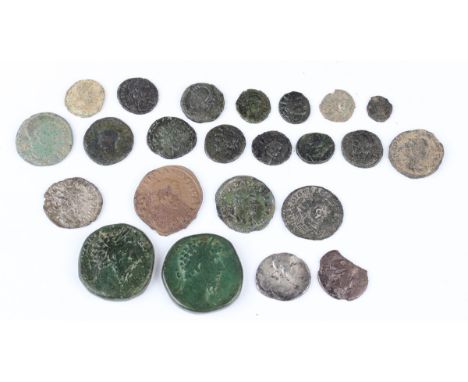 A collection of Roman Republic and Empire coinage, including a Marcus Aurelius sestertius, reverse with 'VICT GERM IMP VI COS