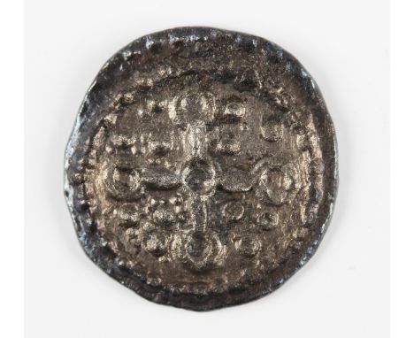 An early Anglo-Saxon period sceatta, secondary phase, annulet cross type, obverse with degenerated radiate bust facing right,