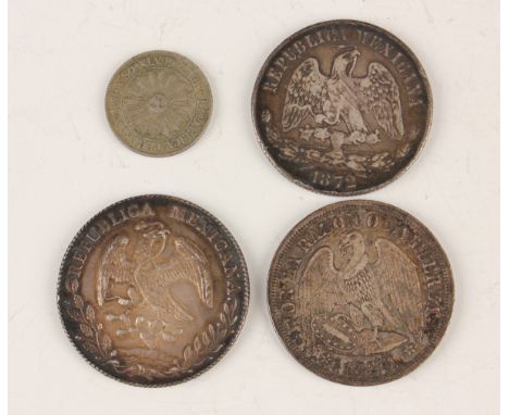 A collection of European and world coins and banknotes, including a Republic of Chile one peso 1876, a Republic of Mexico one