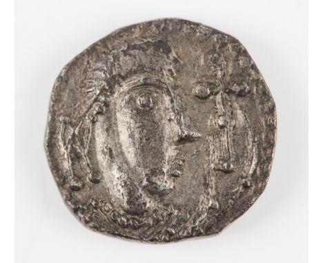 An early Anglo-Saxon period sceatta, secondary phase, series K, obverse with diademed bust, reverse with serpent-headed coile