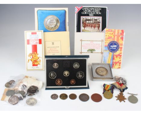 A collection of British and world coins, medals and medallions, including a First World War 1914-15 Star to 'SS-15928 Pte. R.