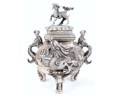 A Chinese Jiajing style polished metal censer, heavily decorated with dragon knop, etched (removable) lid and bombe body rais