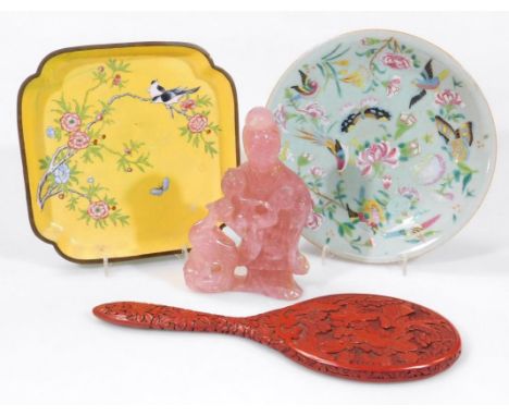 Various Chinese artefacts, comprising an early 20thC cinnabar hand mirror, the oval glass with a heavily carved back set with