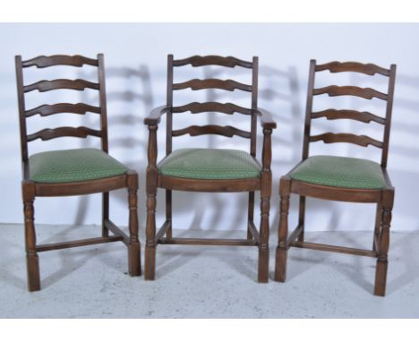 Set of six beechwood dining chairs, wavy ladder backs, drop in seats, turned legs joined by H stretchers, comprising two elbo