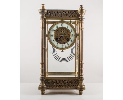 Edwardian brass cased "Fowglass" mantel clock, case with a cast frieze, fluted columns, circular dial, cylinder movement stri