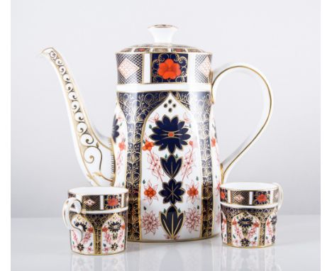 Royal Crown bone china matched coffee set, Old Imari pattern No. 1128, comprising oval tapering coffee pot, 24cm, six coffee 