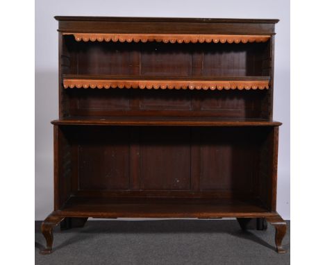 Edwardian oak waterfall bookcase, adjustable open shelf, on square section cabriole legs, width 117cm.