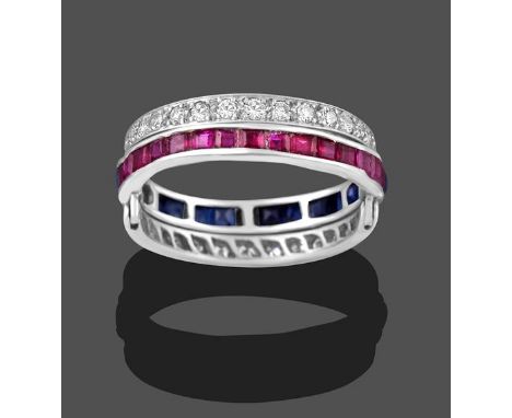 A Ruby, Sapphire and Diamond Eternity Swivel Ring, the main band channel set in white with calibré cut sapphires on one side 