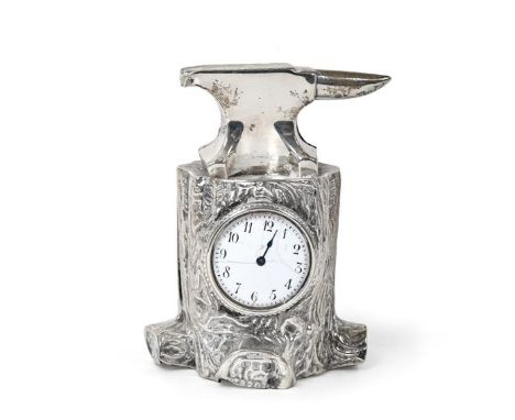 A Victorian Silver Novelty Timepiece, by Douglas Clock Co., Birmingham, 1898, modelled as an anvil resting on a tree-stump, 9