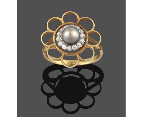 A Cultured Pearl and Diamond Cluster Ring, stylised in the form of a flower, the cultured pearl within a border of old cut di