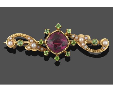 A Garnet and Split Pearl Brooch, a cushion cut reddish-purple garnet in a yellow millegrain setting within a border of round 